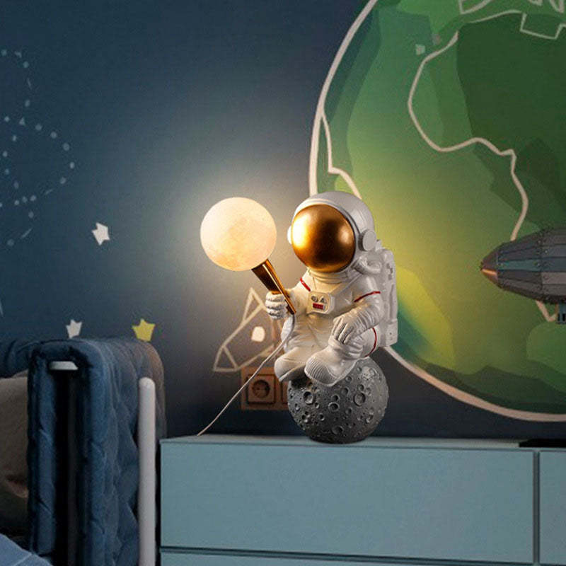 Contemporary Cartoon Astronaut Resin Sconce