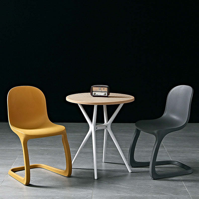 Scandinavian Bow-Frame Plastic Steel Dining Chair — Yellow