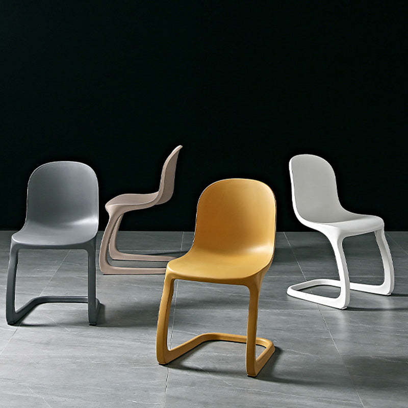 Scandinavian Bow-Frame Plastic Steel Dining Chair — Pink