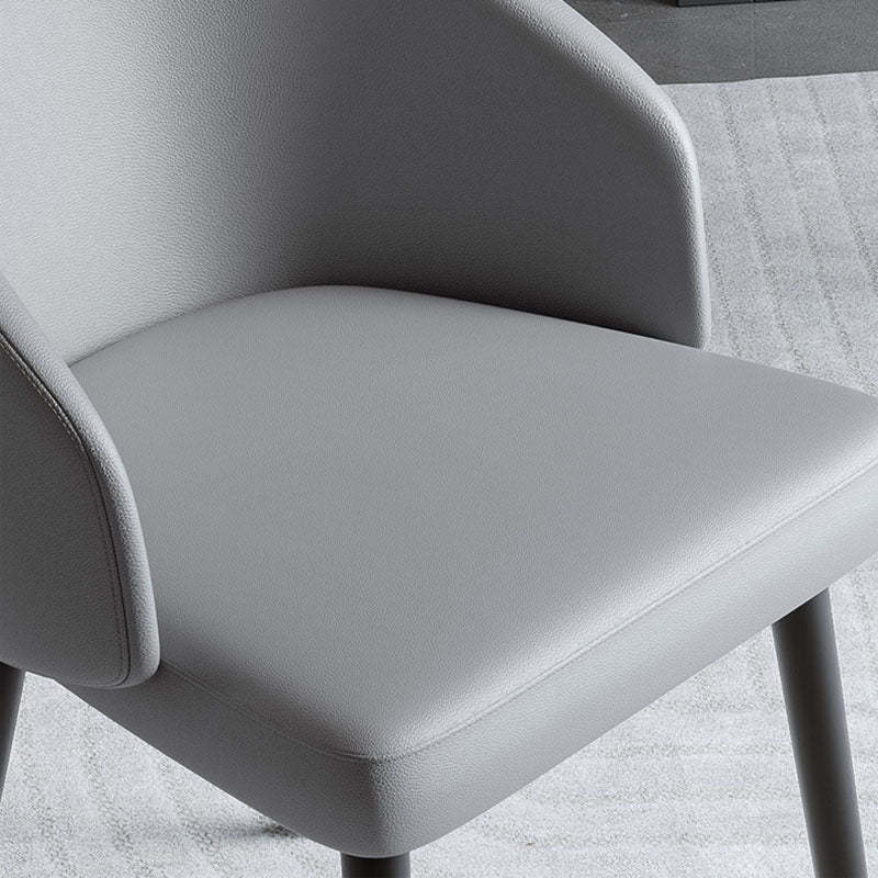 Nordic Trapezoid Saddle Leather Ash Dining Chair