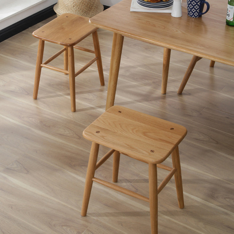 Traditional footrest accent chairs in wood
