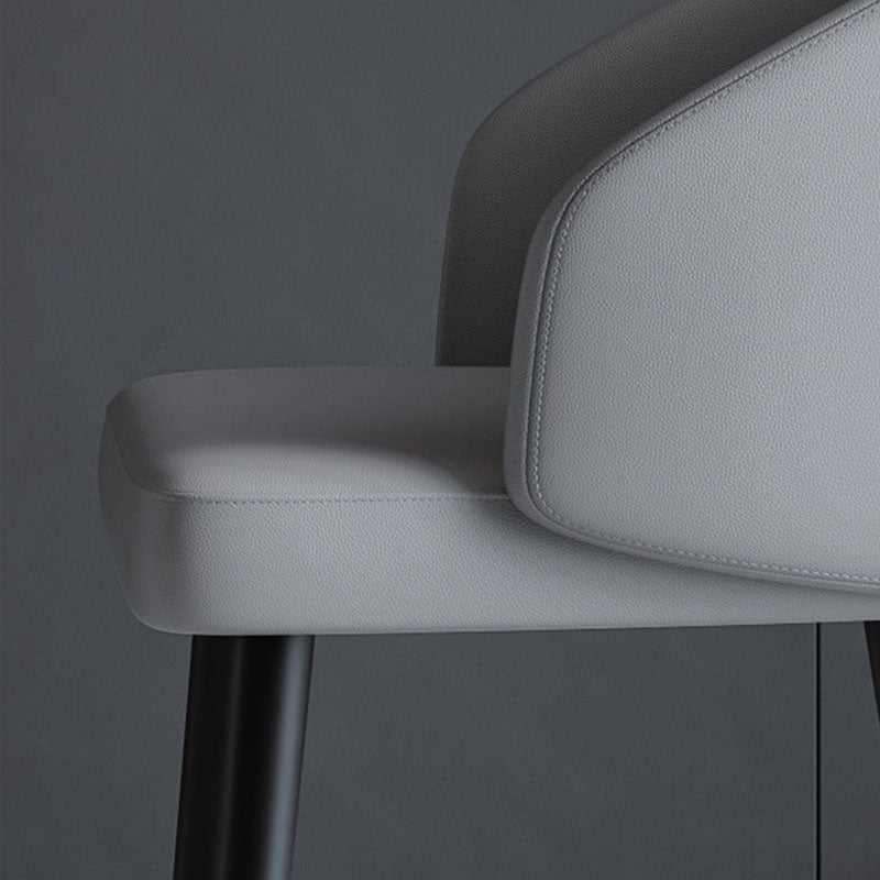 Nordic Trapezoid Saddle Leather Ash Dining Chair