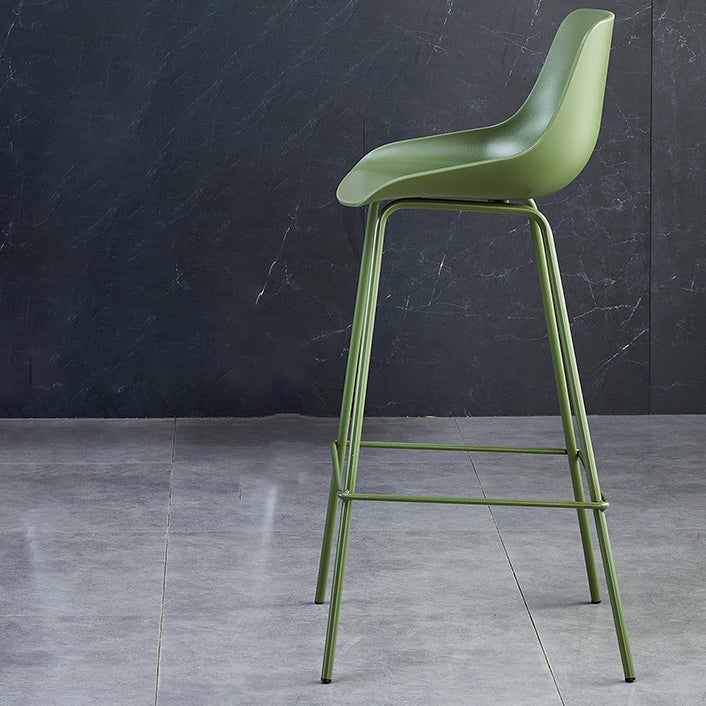 Minimalist curved green bar & counter stools in metal fabric