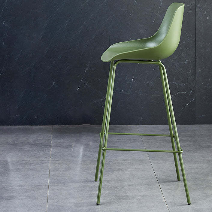 Minimalist curved green bar & counter stools in metal fabric