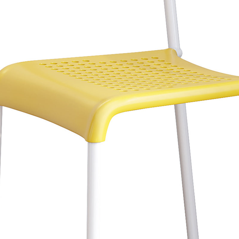 Minimalist Plastic Iron Perforated Dining Chair — Yellow