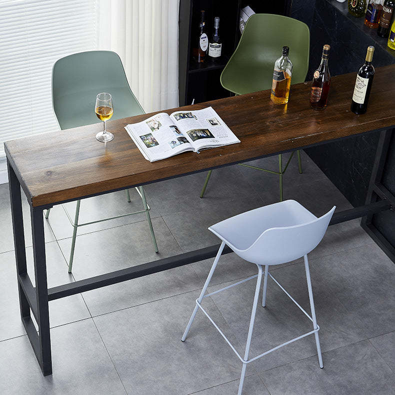 Minimalist curved green bar & counter stools