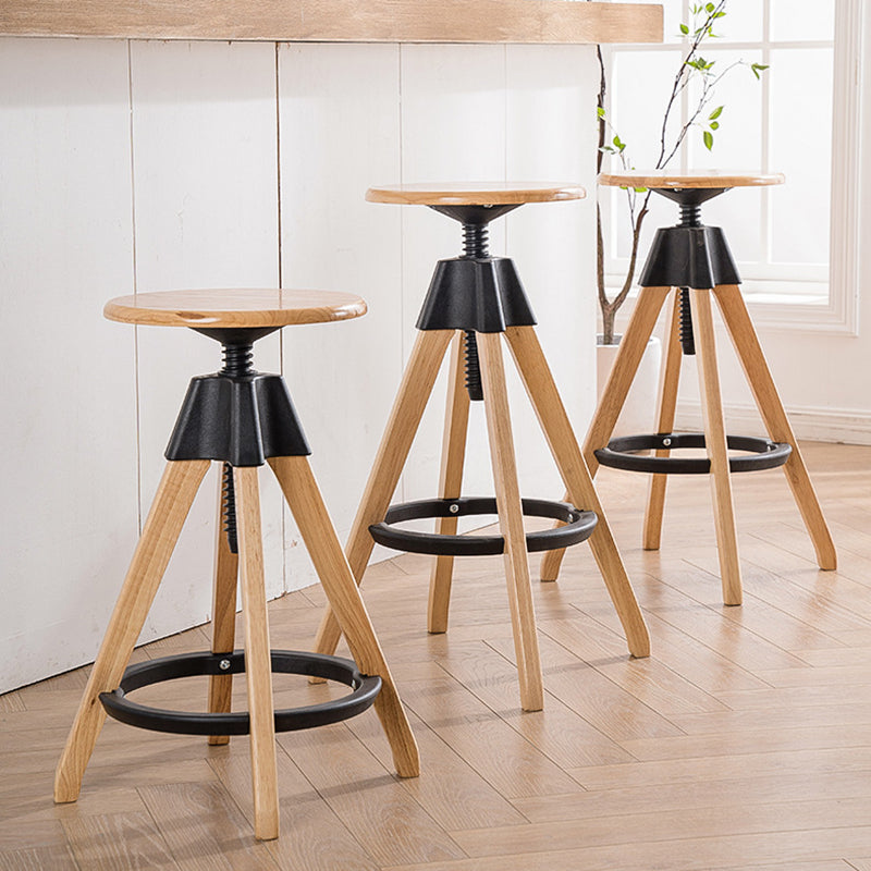Nordic tripod bar & counter stools in wood — 20.47" L x 20.47" W x 25.98"-31.1" H