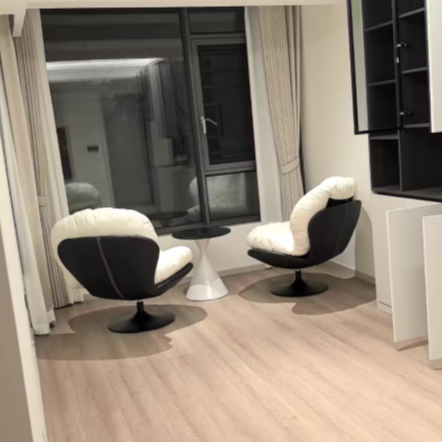 Nordic Leather Swivel Lounge Chair