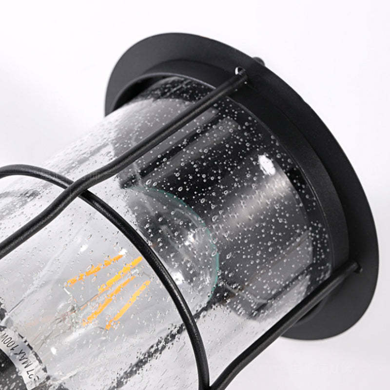 Contemporary Iron Frame Glass Cylinder Outdoor Wall Sconce