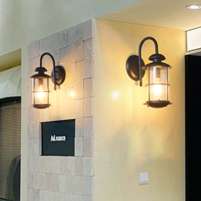 Contemporary Iron Frame Glass Cylinder Outdoor Wall Sconce