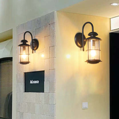 Contemporary Iron Frame Glass Cylinder Outdoor Wall Sconce