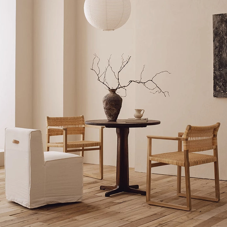 Mid-century crossed-base round coffee tables in wood leather linen