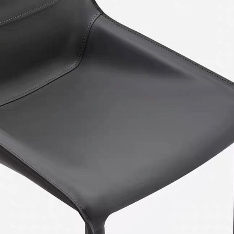 Minimalist Steel Saddle Leather Dining Chair