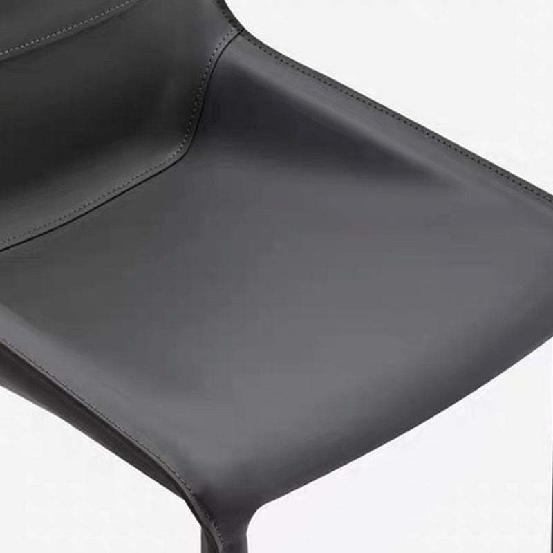 Minimalist Steel Saddle Leather Dining Chair