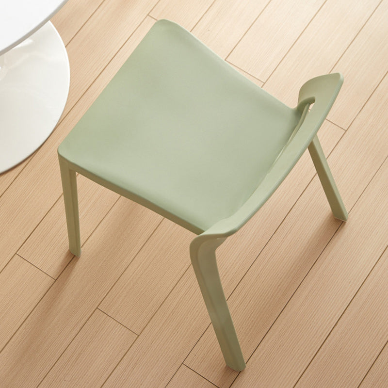 Contemporary Backless Plastic Chair — Yellow