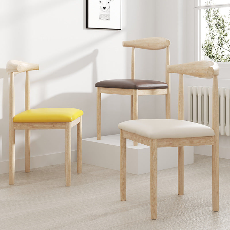 Vintage Upholstered Carbon Steel Dining Chair — Sponge / Yellow Leather / Wood
