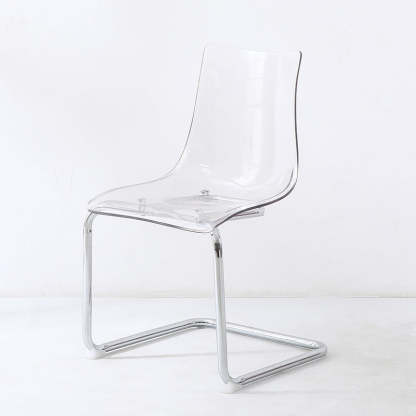Minimalist Plastic Metal Curved Dining Chair — Clear