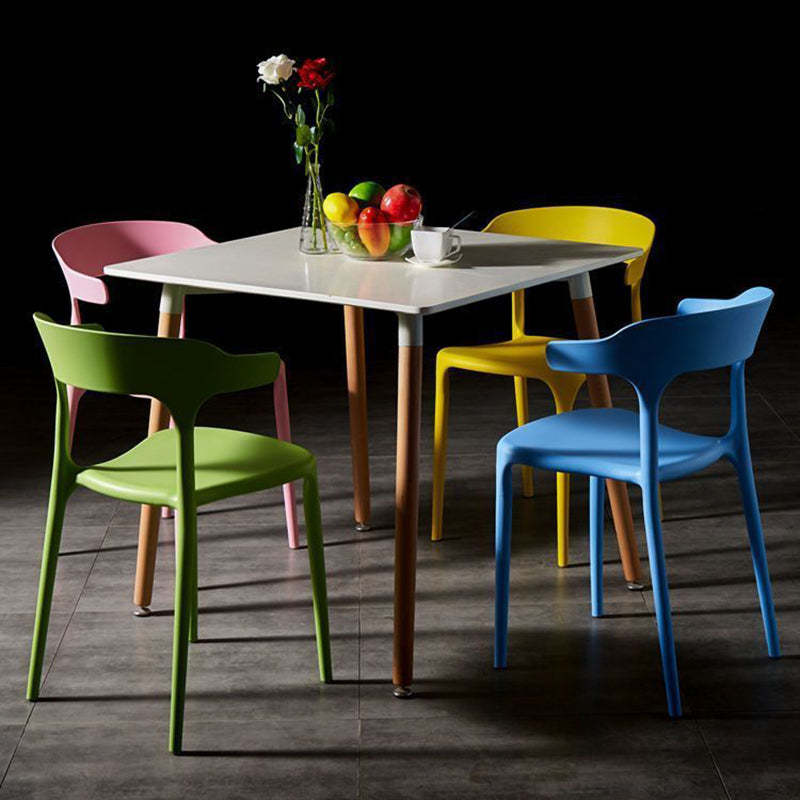 Scandinavian Stackable Arc Plastic Dining Chair — Yellow