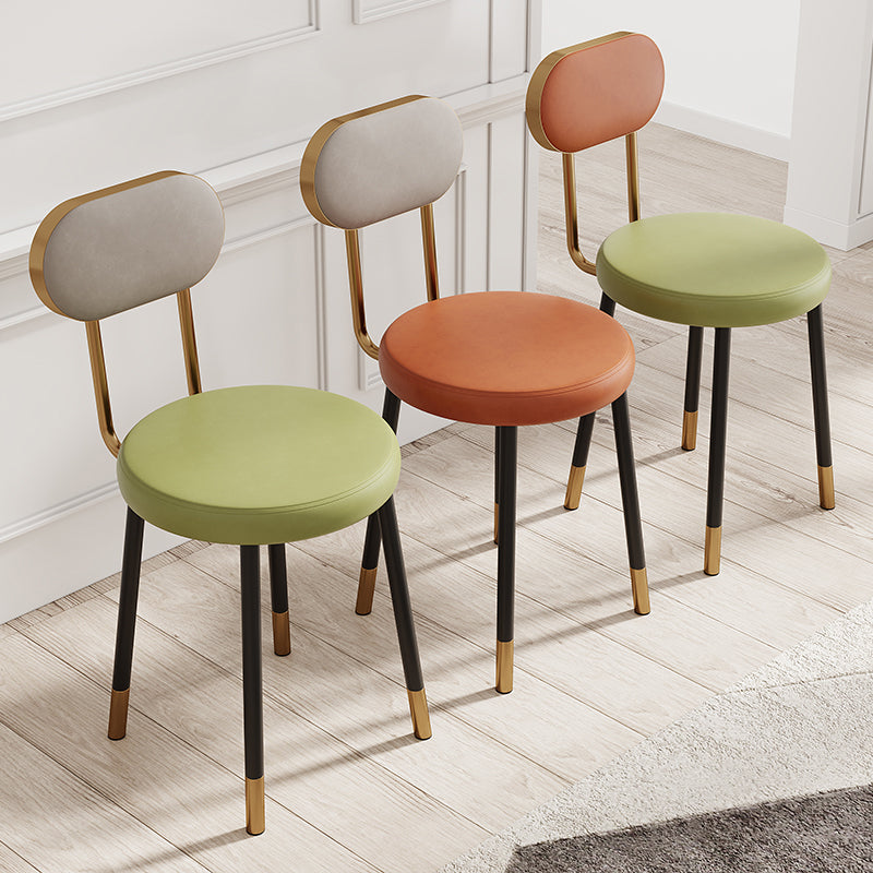 Minimalist Leather Carbon Steel Round Dining Chair — A