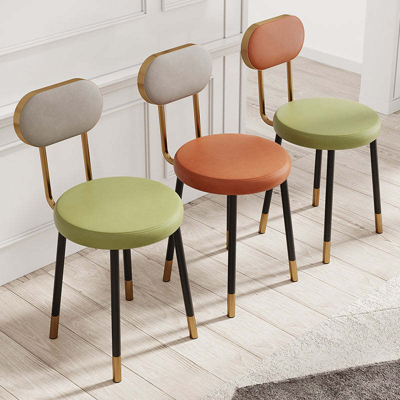 Minimalist Leather Carbon Steel Round Dining Chair — A