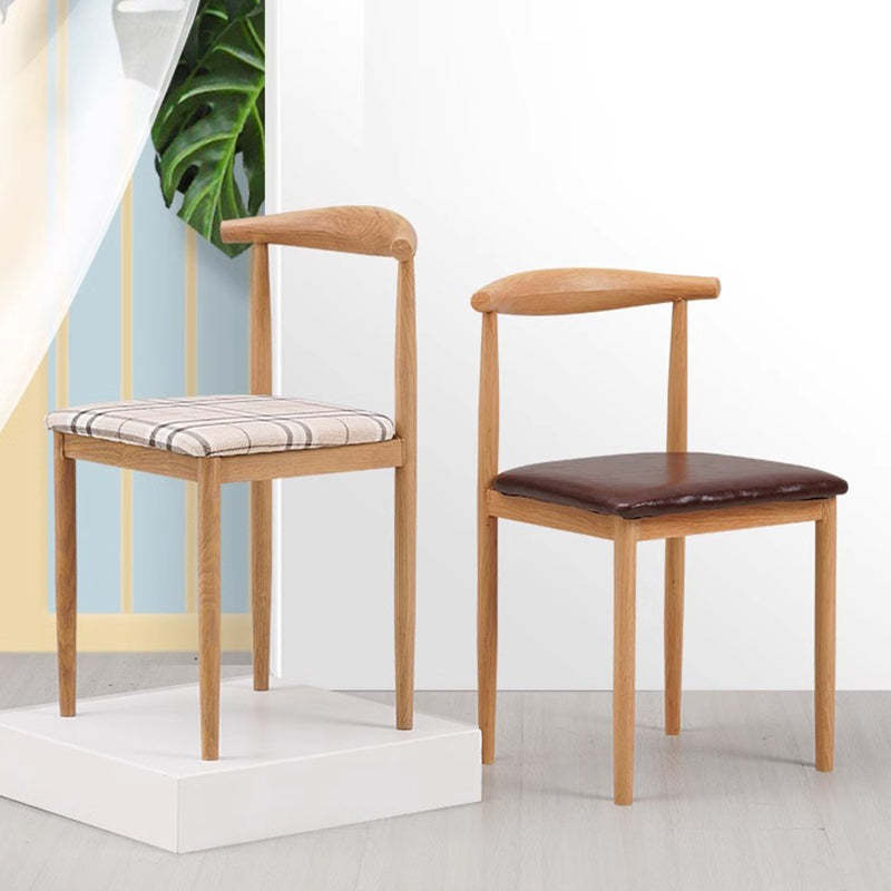 Minimalist Leather Carbon Steel Dining Chair — A - Black