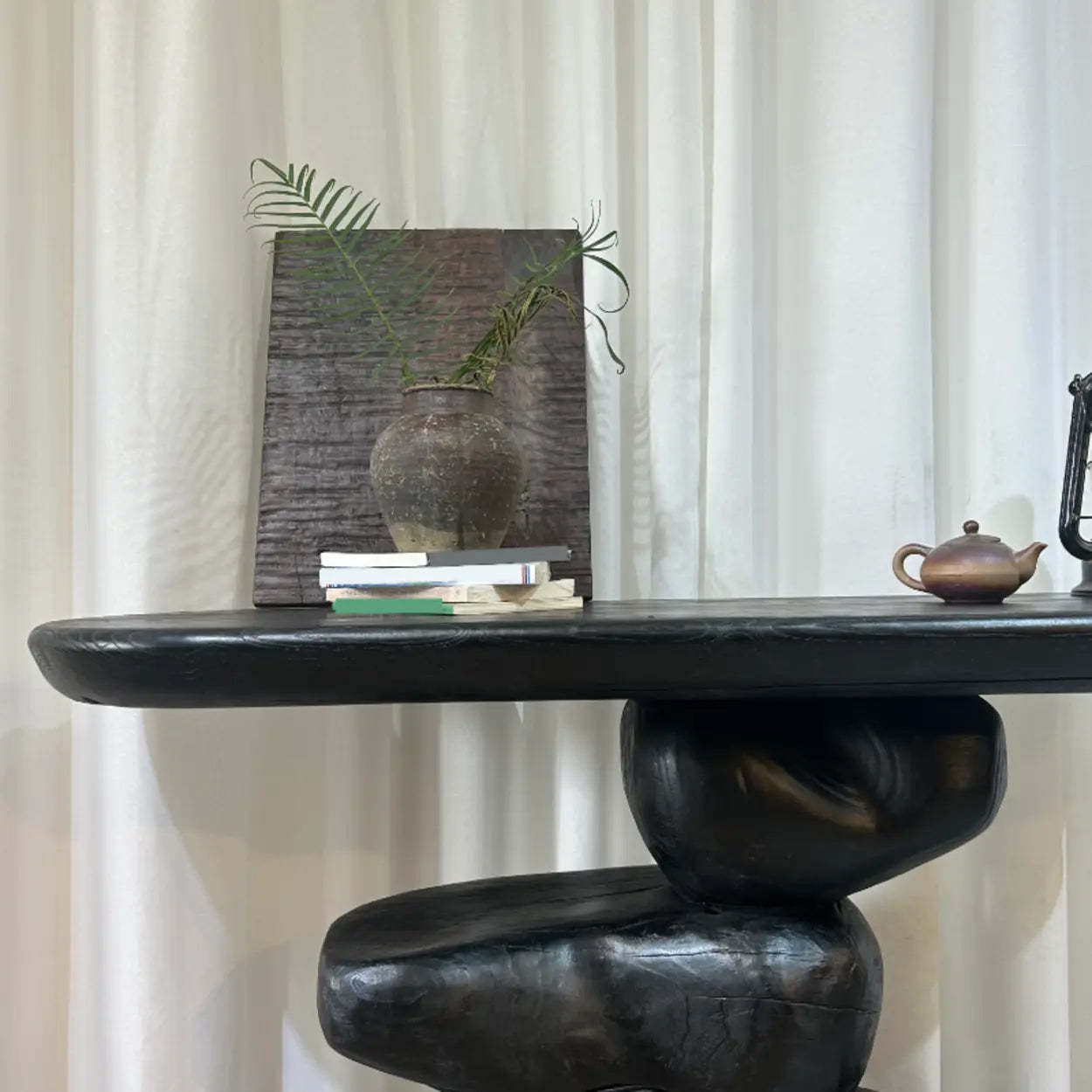 Artistic Pebble Base Black Wood Console Table