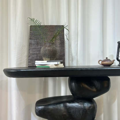 Artistic Pebble Base Black Wood Console Table