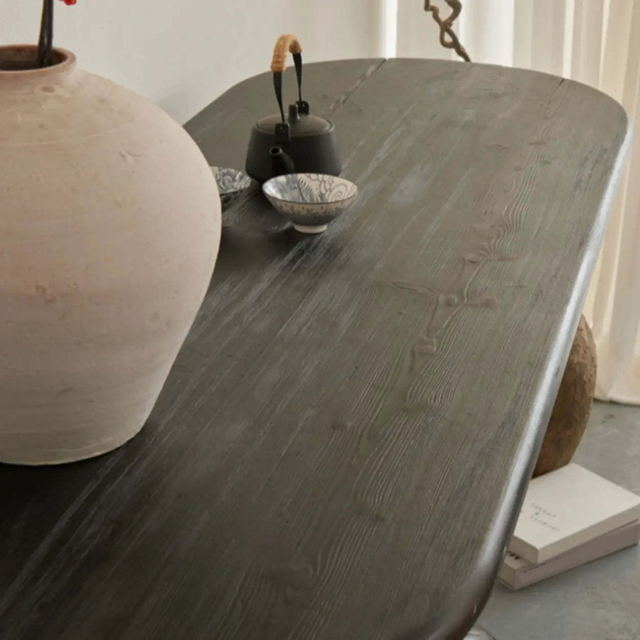 Artistic Pebble Base Black Wood Console Table