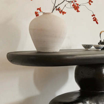 Artistic Pebble Base Black Wood Console Table