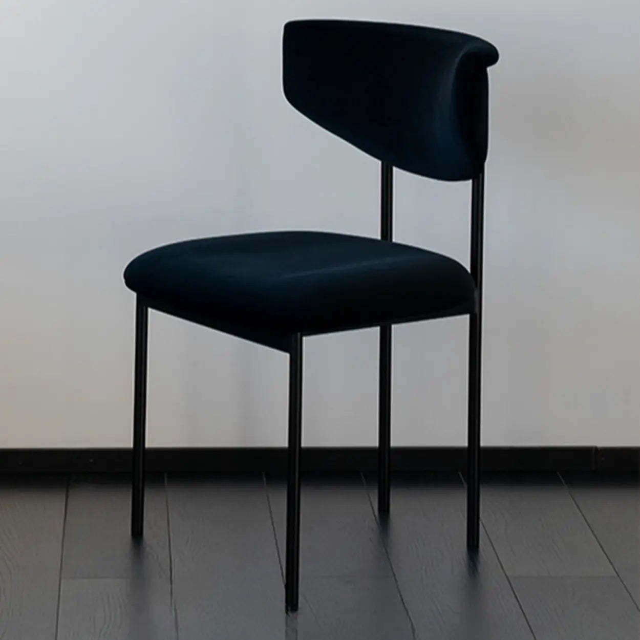 Black Curved Upholstered Low-Back Dining Chair — Cream