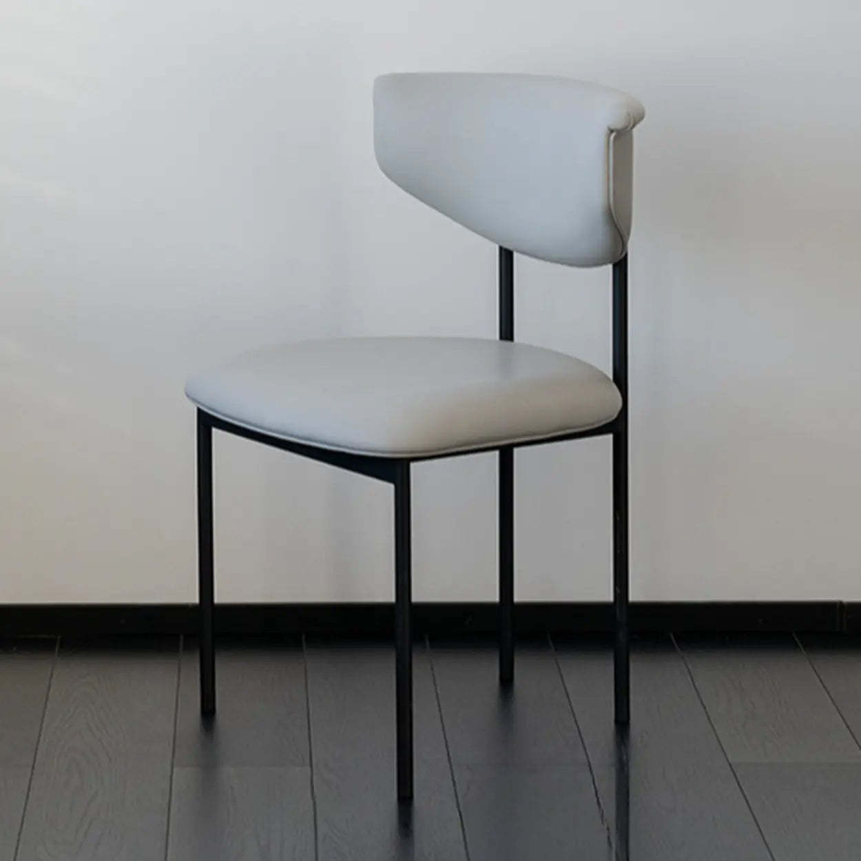 Black Curved Upholstered Low-Back Dining Chair — Grey