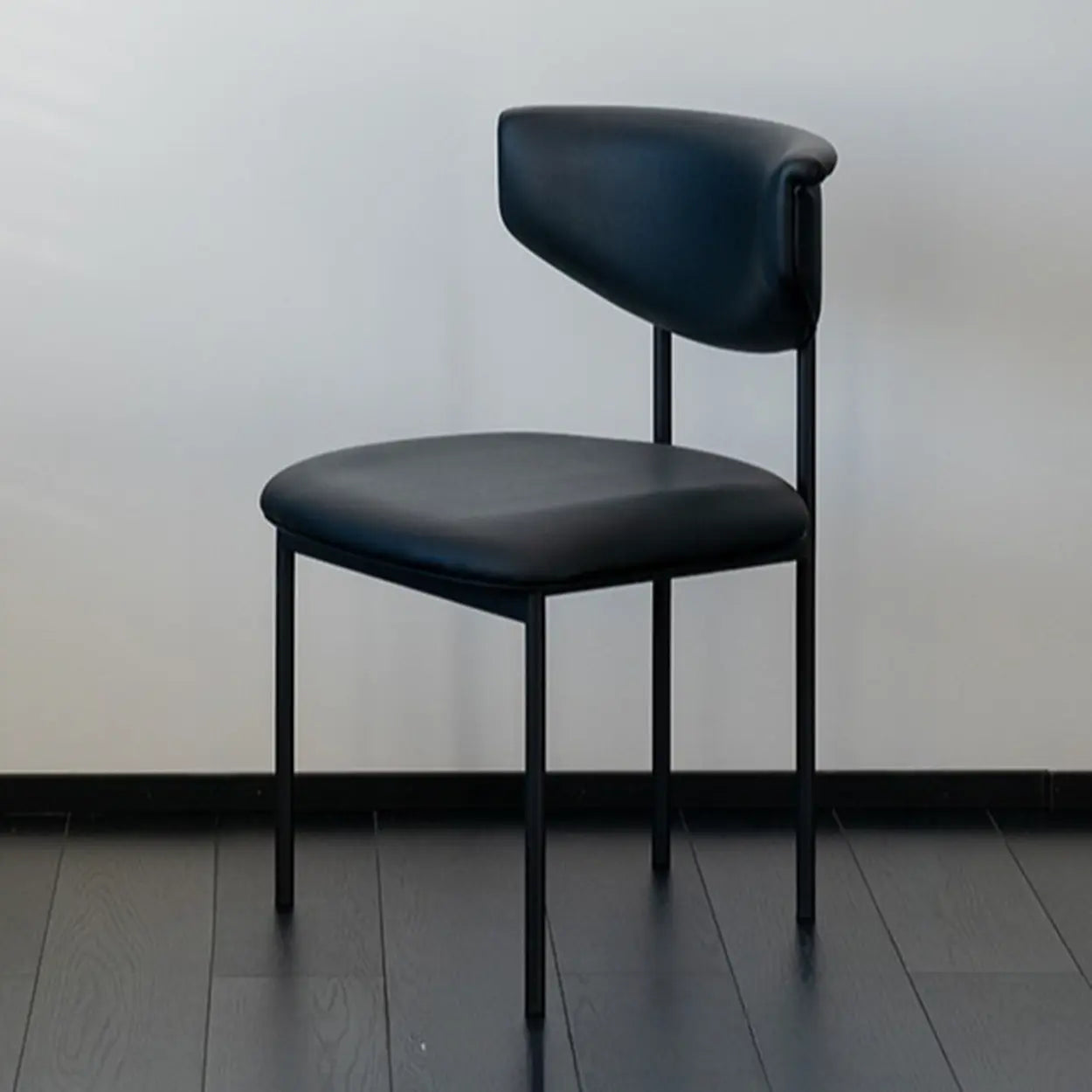 Black Curved Upholstered Low-Back Dining Chair