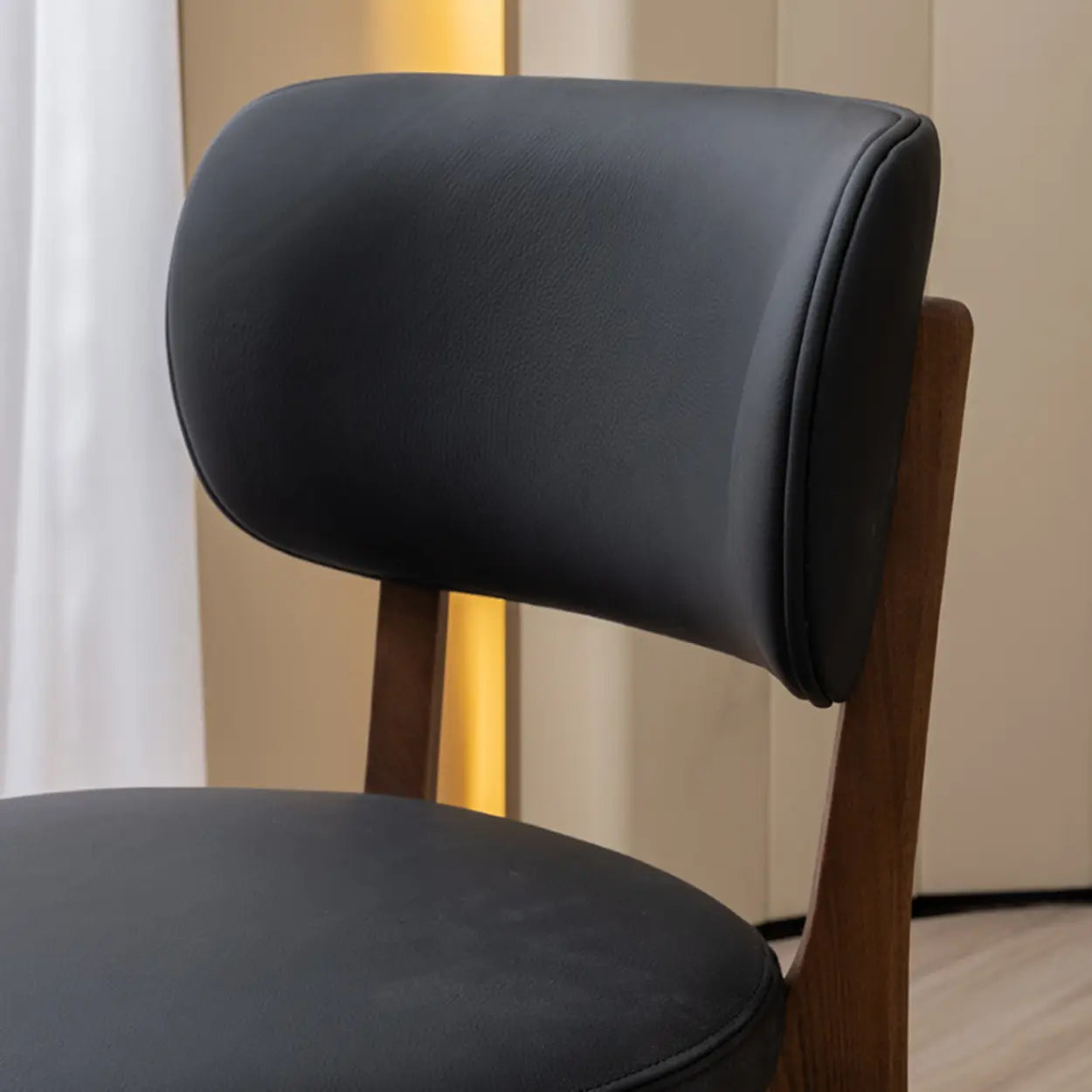 Black Curved-Back Leather Armless Wood Dining Chair