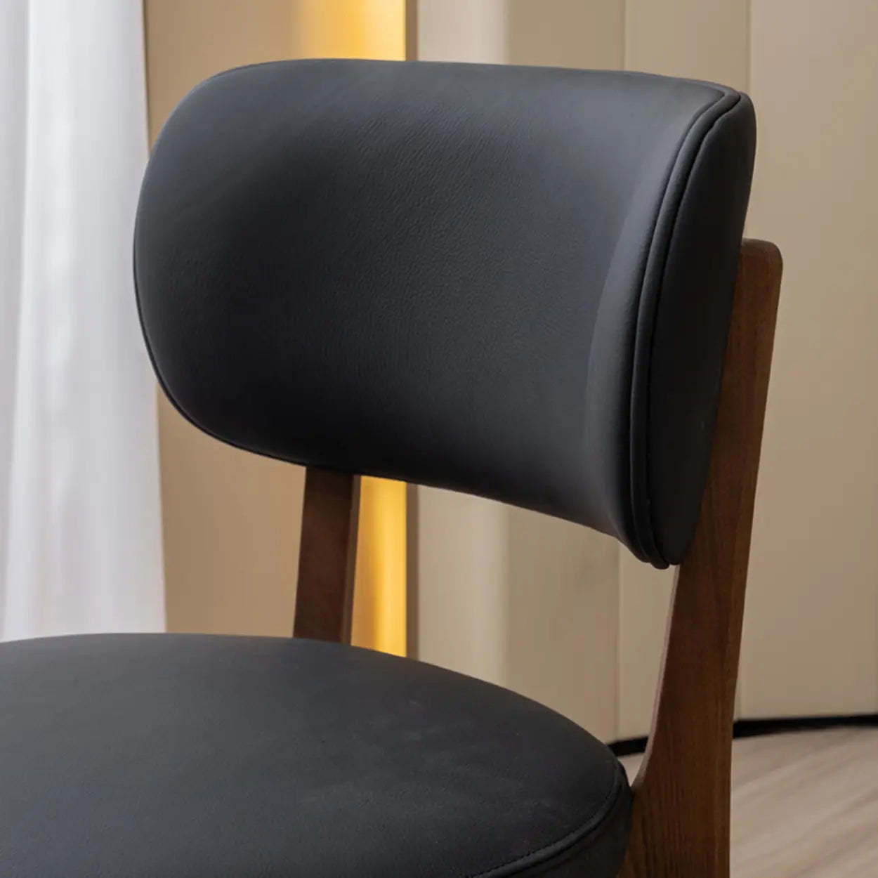 Black Curved-Back Leather Armless Wood Dining Chair