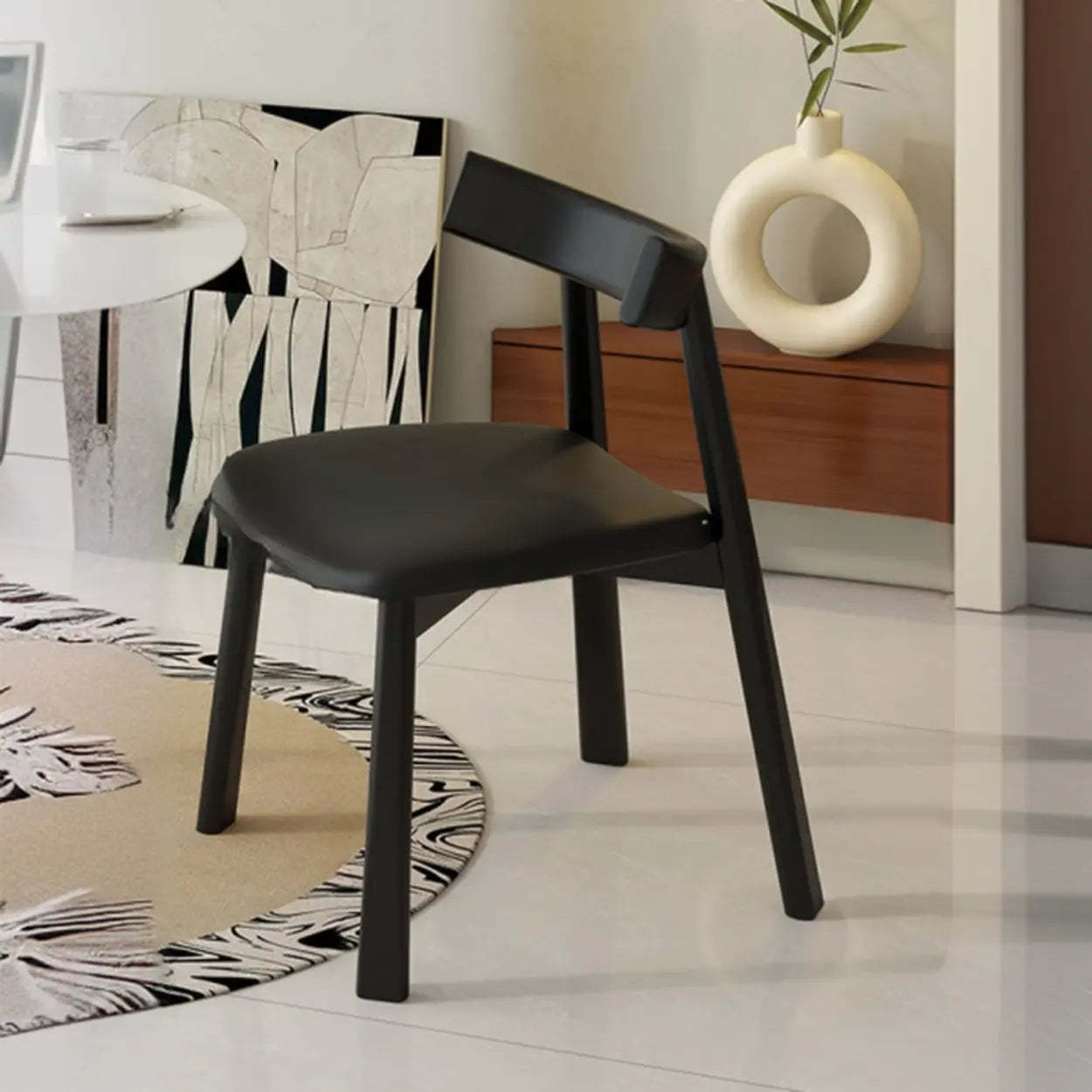 Black modern curved-back upholstered dining chairs & benches