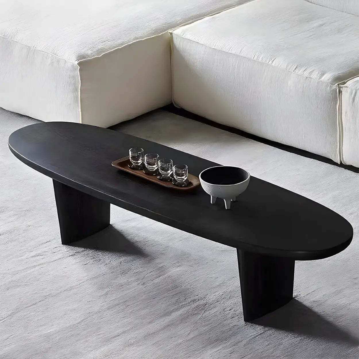Lighom modern oval double-pedestal black coffee tables — 39" L x 19" W x 16" H