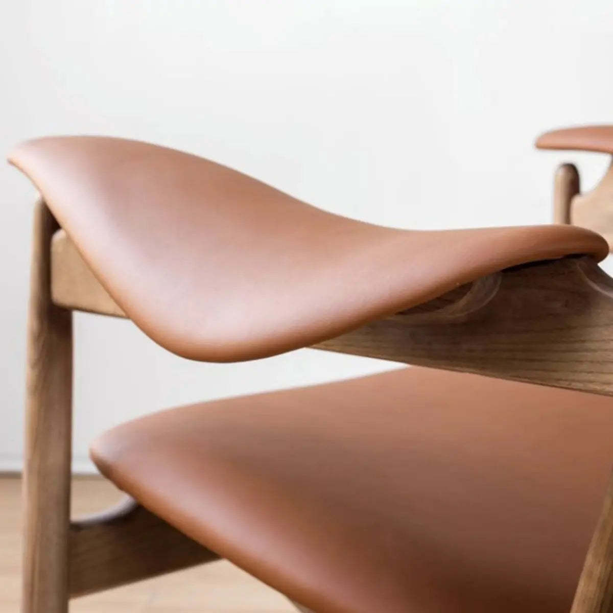 Brown Leather Fixed-Back Arm Chair with Four Legs