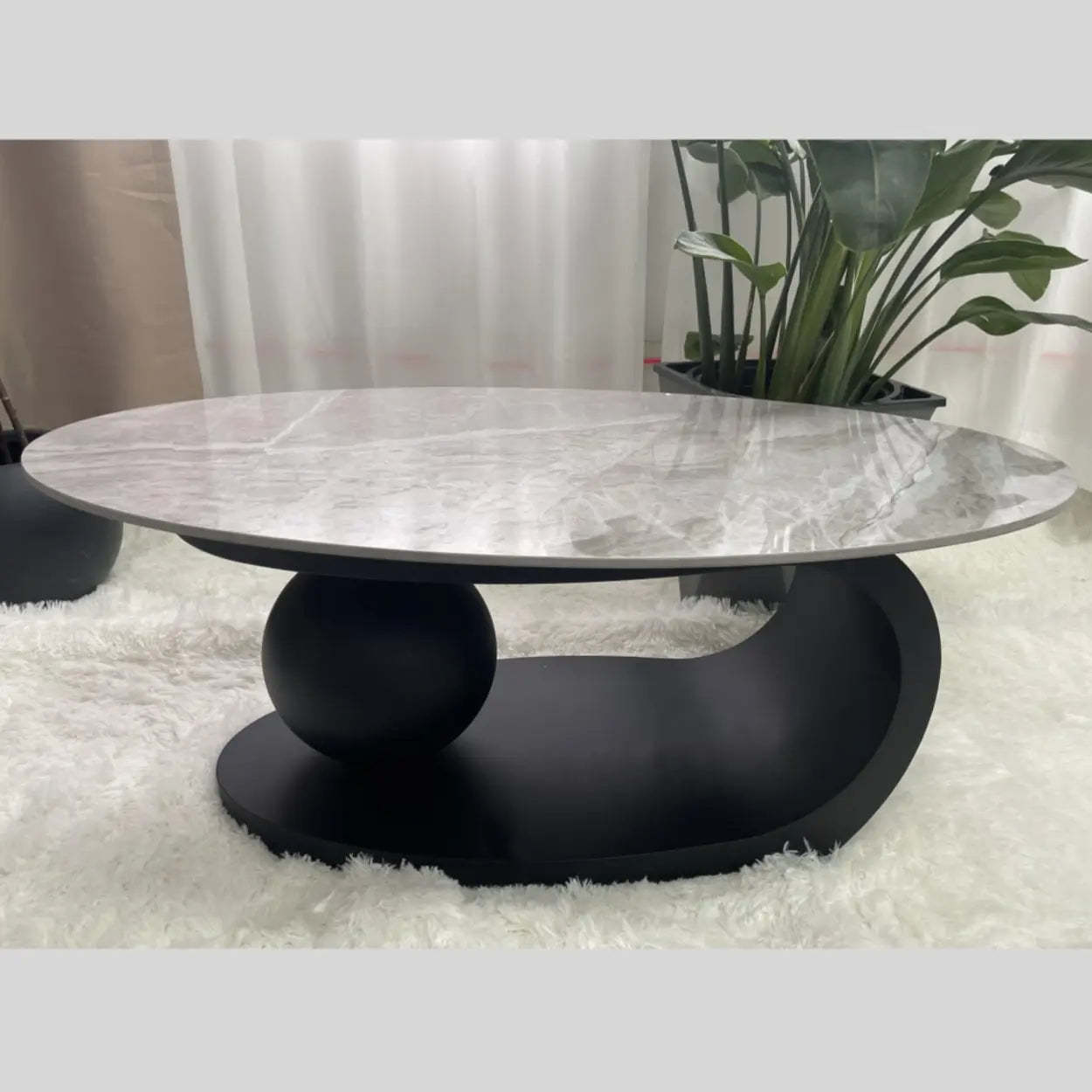 Stone-Top Coffee Table with Abstract Metal Base — Black
