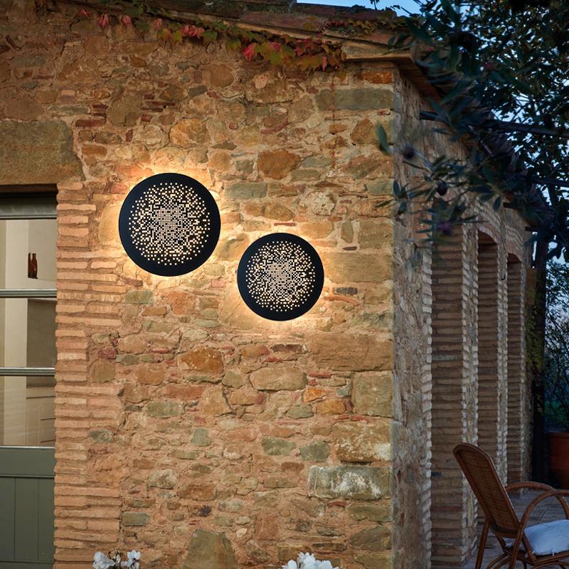 Black metal hollow circular outdoor wall lighting - art deco — 10"