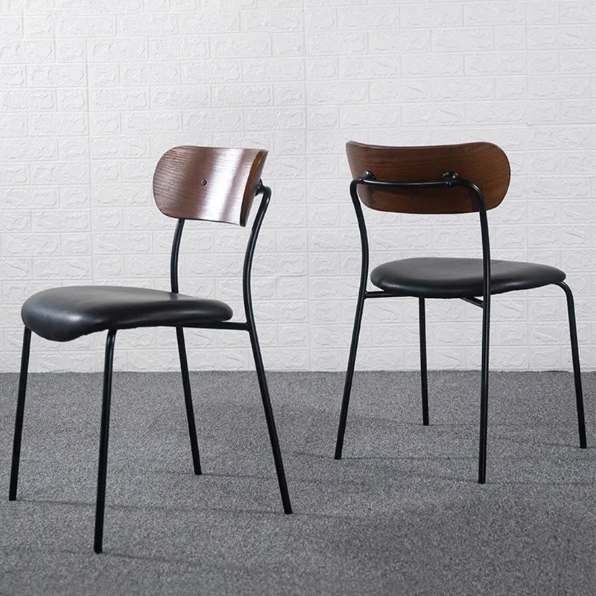 Contemporary curved dining chairs & benches in leather — Black / Brown
