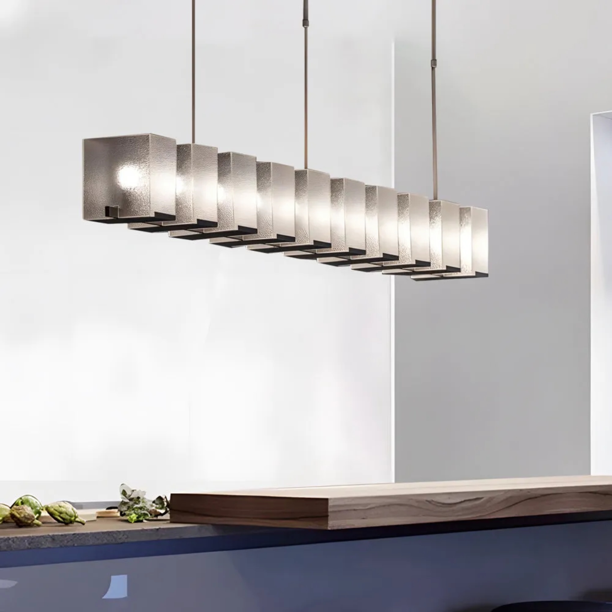 Modern long pendant lighting in glass metal concrete