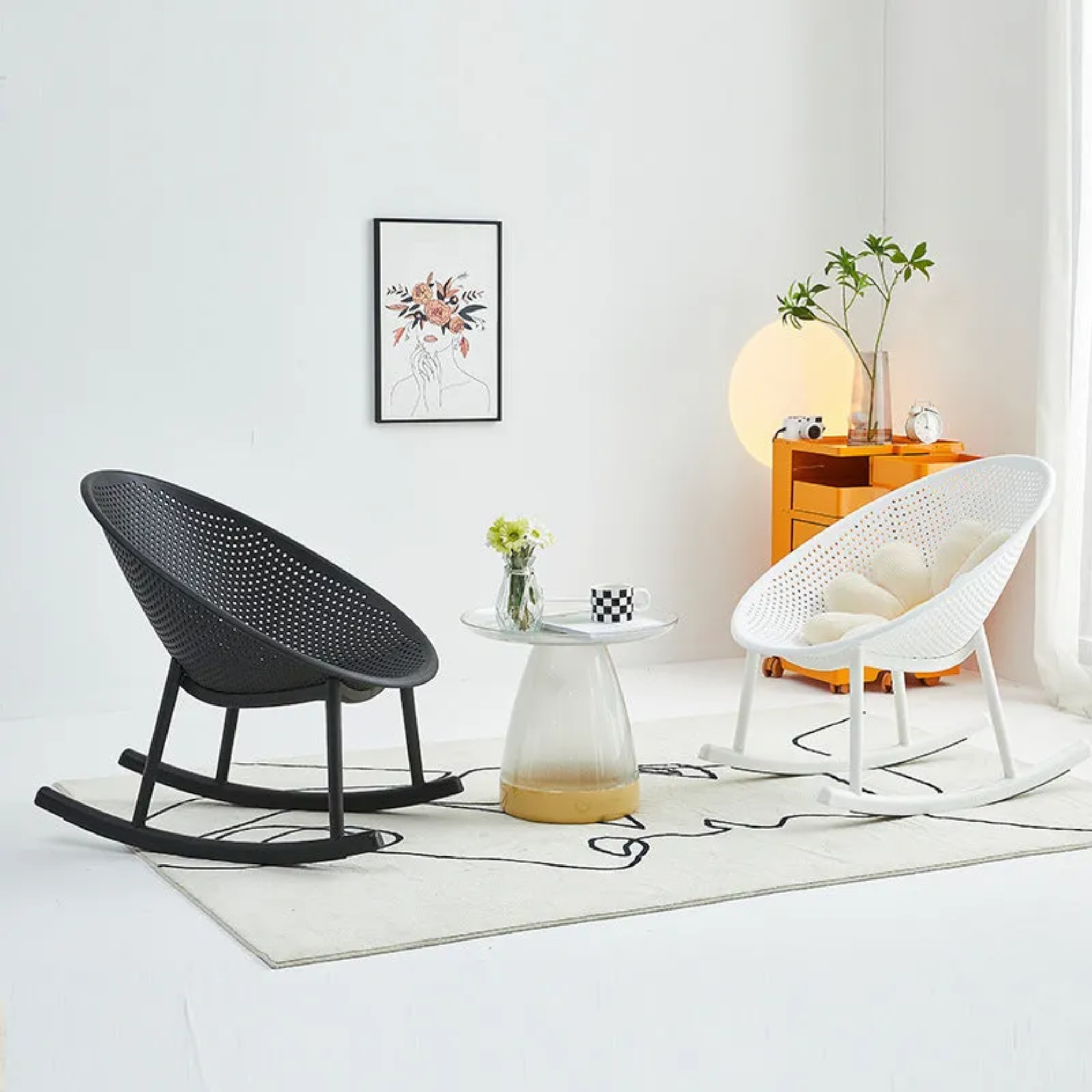 Minimalist oval hollowed black rocking chairs