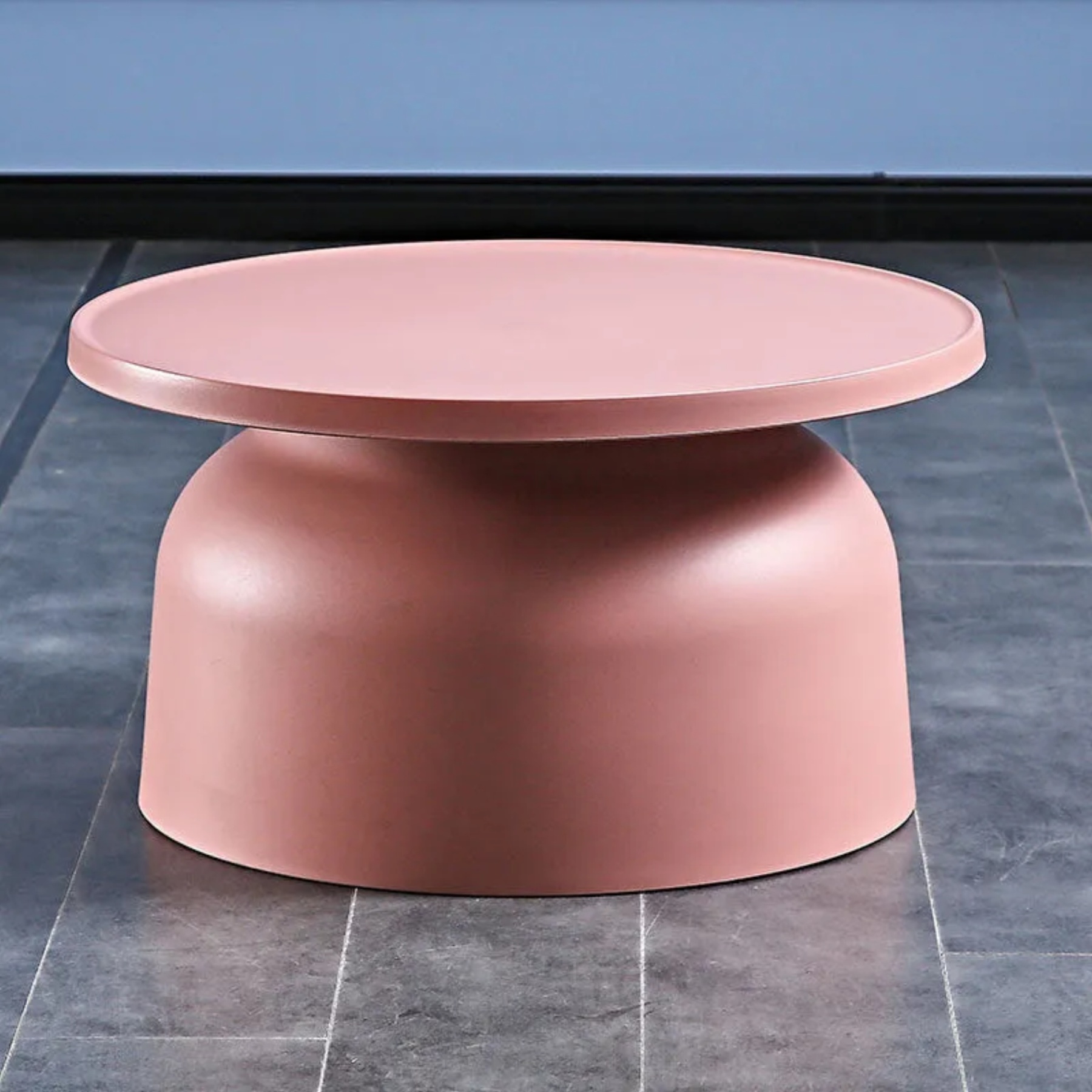 Round pink glass coffee tables for living room