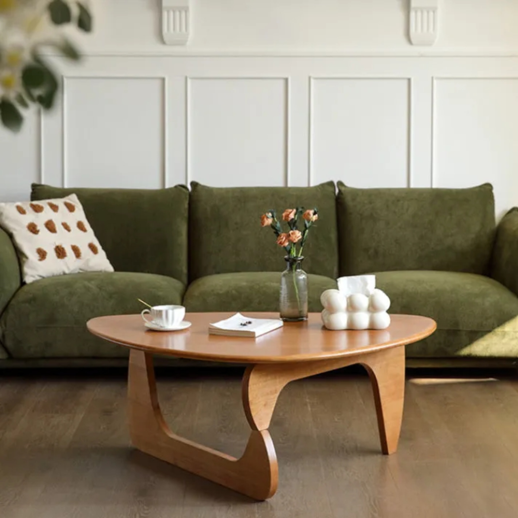 Minimalist solid triangular coffee tables in wood — 35" L x 22" W x 15" H / Walnut