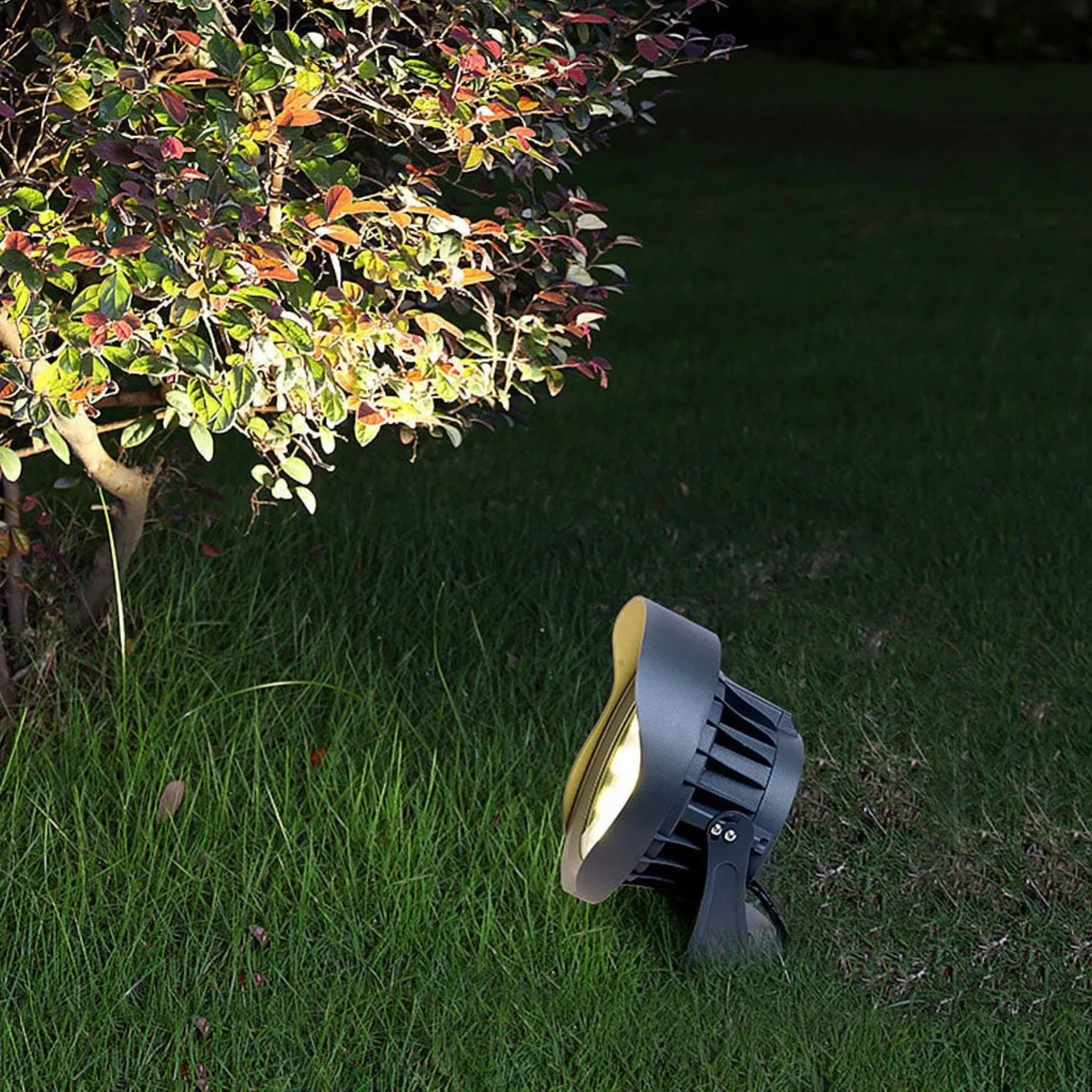 Gray Industrial outdoor light in garden, metal and glass finish