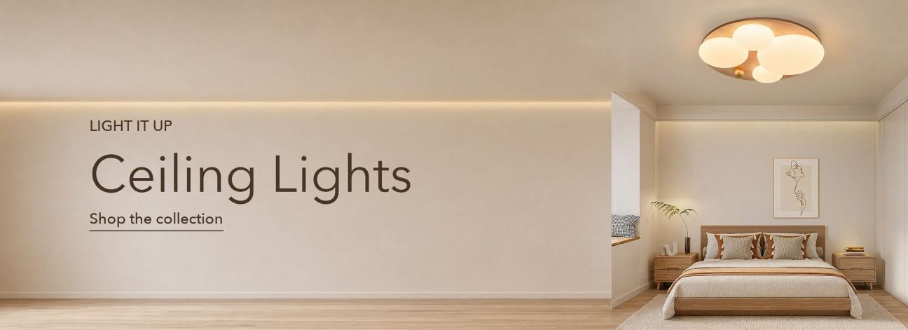 Round wood flush mount ceiling light with frosted glass globes above a bed in a warm minimalist bedroom, Lighom ceiling lights collection