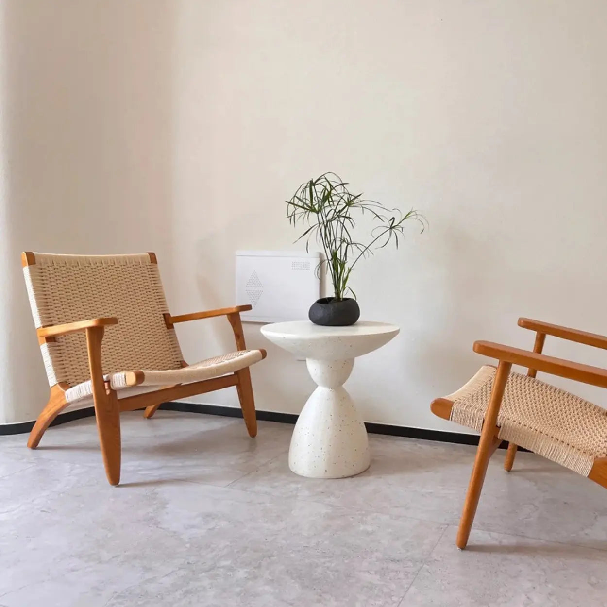 Minimalist Sculpted Round White Side Table