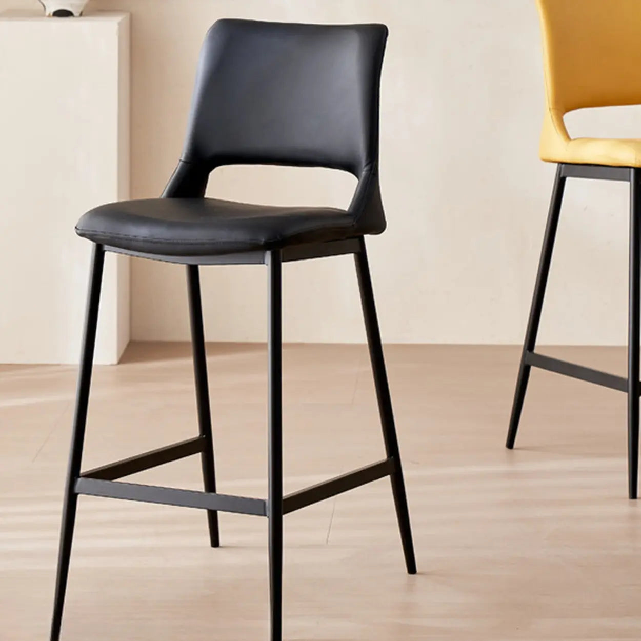 Minimalist Upholstered Low-Back Leather Saddle Bar Stool — Black