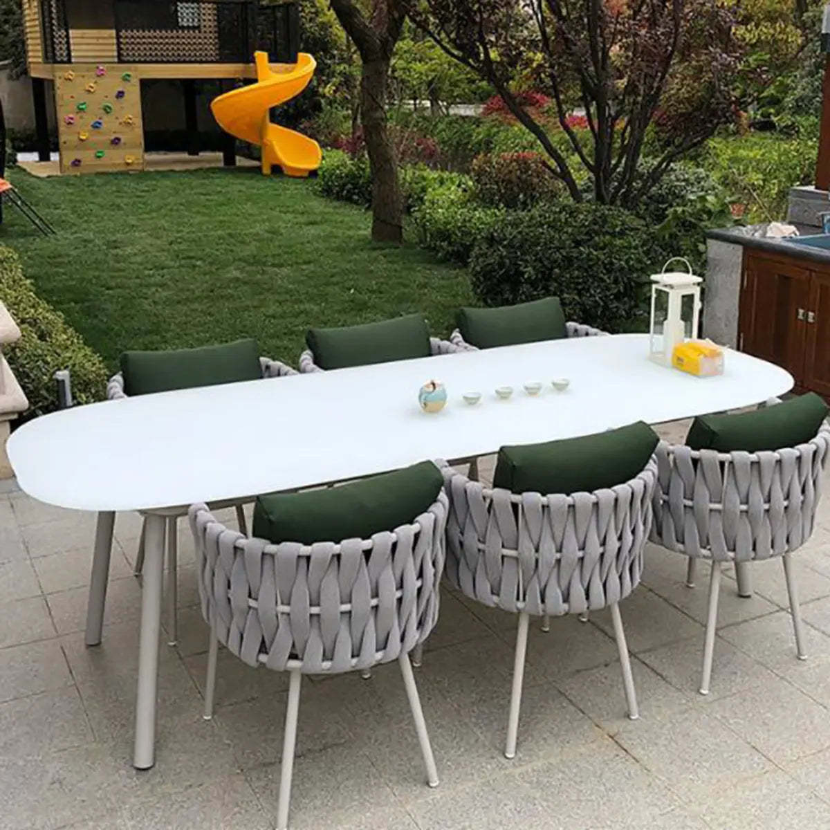 White Waterproof Stone Oval Outdoor Coffee Table — Black / Table Only