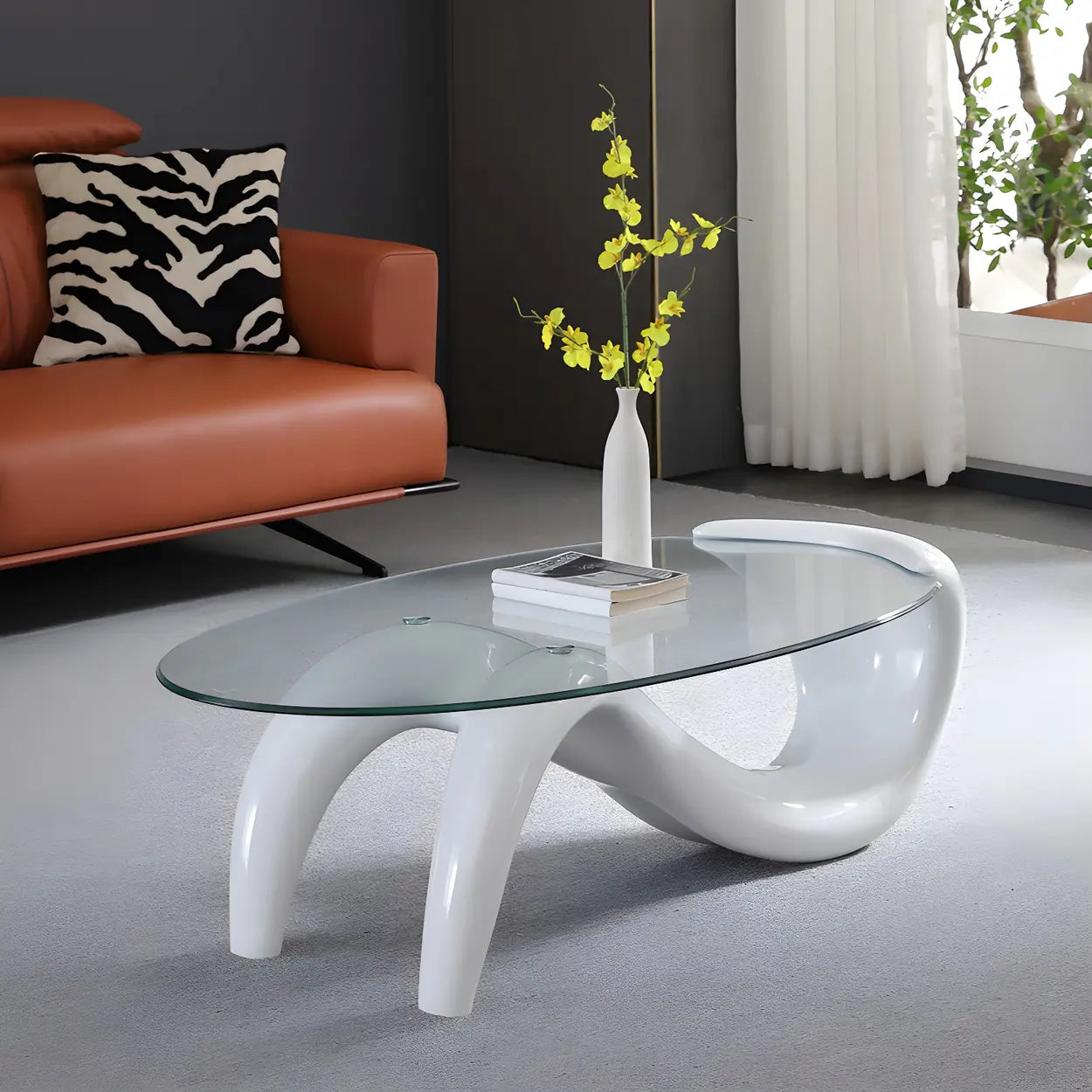 Oval Glass Abstract Metal Base Coffee Table — Orange